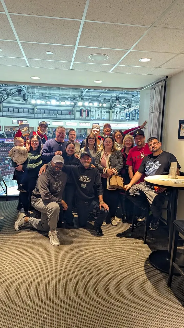 A group of volunteers posing